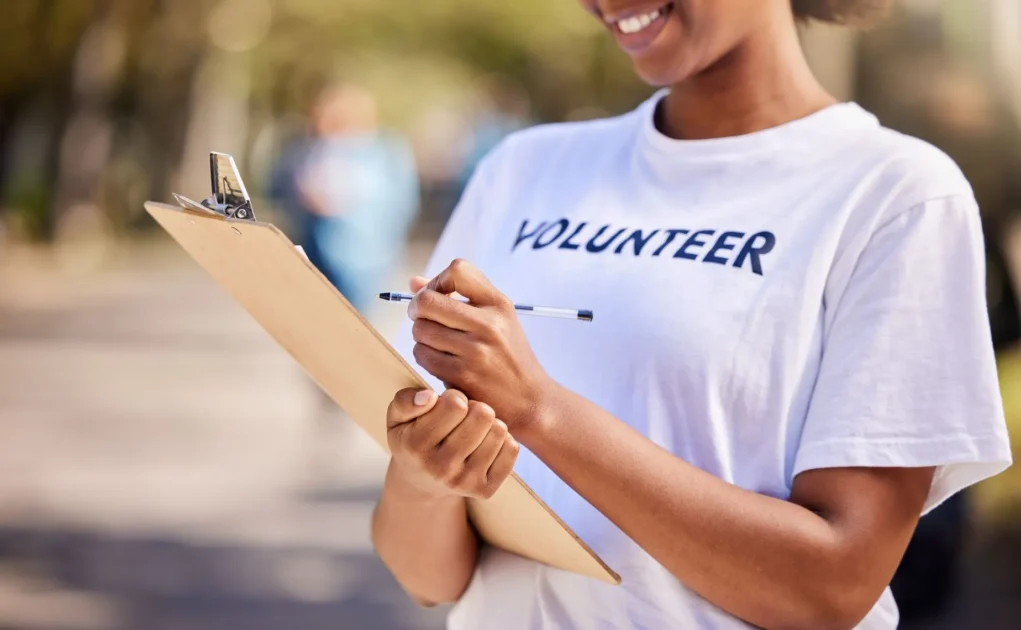 volunteer working on a field