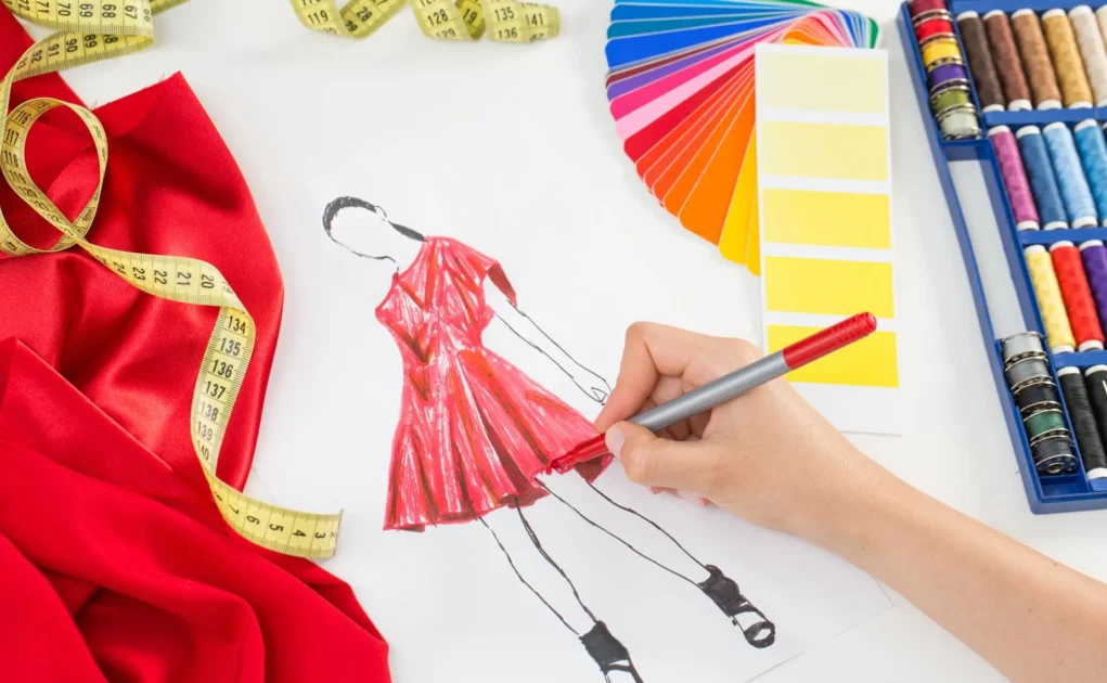 Person sketching the clothing design
