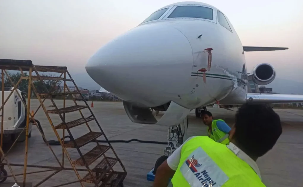 Nepal airlines staff checking thr airplane