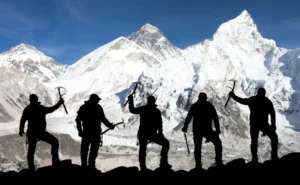 climbers posing infront of the Everest