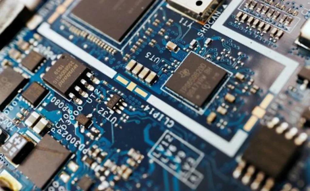 Close-up of memory chips on a circuit board highlighting rising semiconductor costs impacting smartphones and PCs